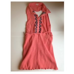 En creme Pink dress with cut out back Size large